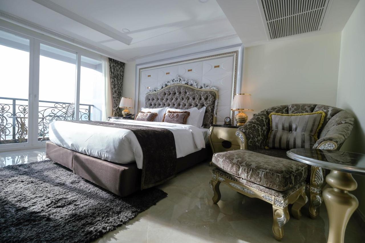 Lk Emerald Beach - Sha Extra Plus Pattaya Luaran gambar A bedroom at the hotel